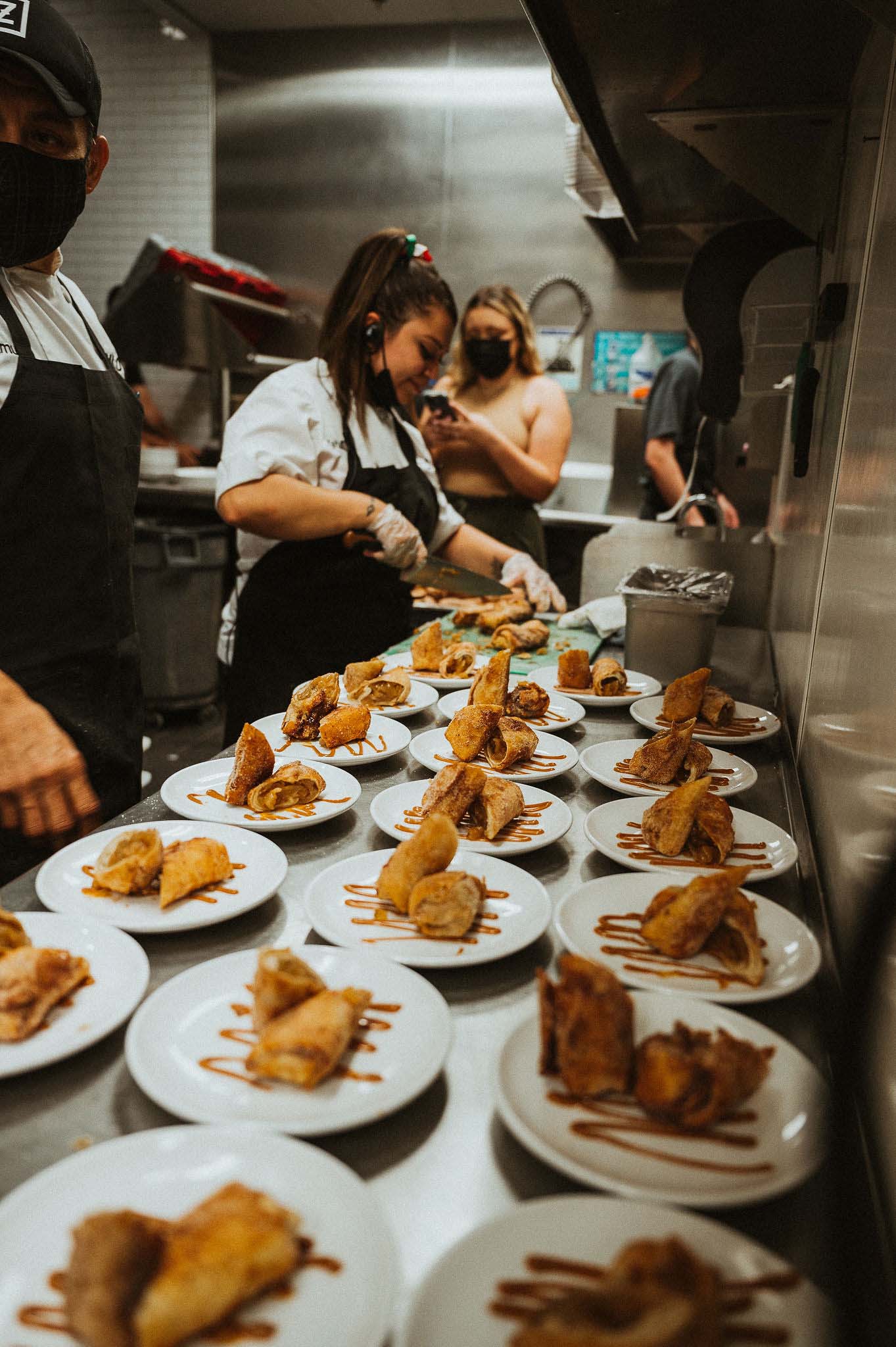 Zócalo kitchen staff plating food